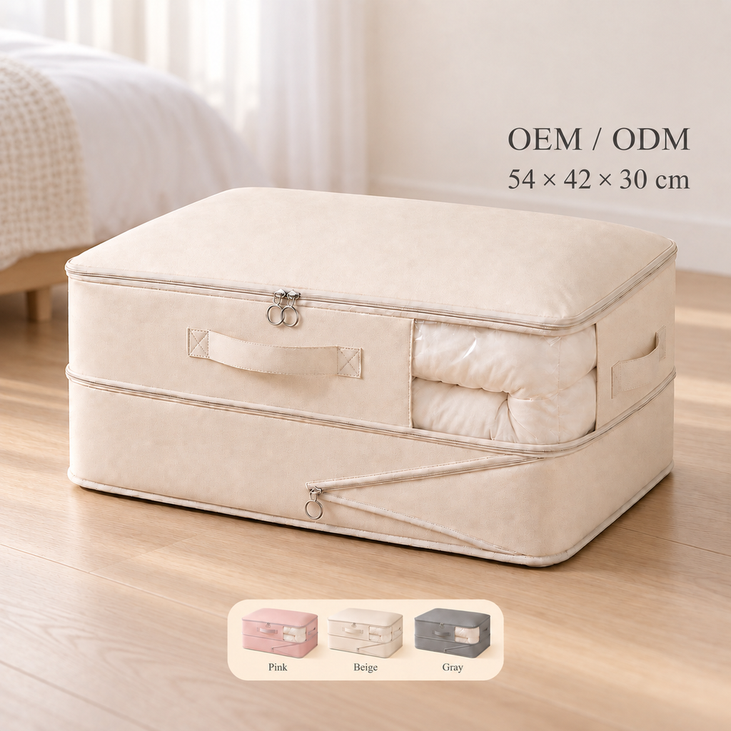 Gray compression quilt storage bag made from 150 gsm twill fabric, with a clear front window and carry handles, shown expanded to 54 × 42 × 30 cm