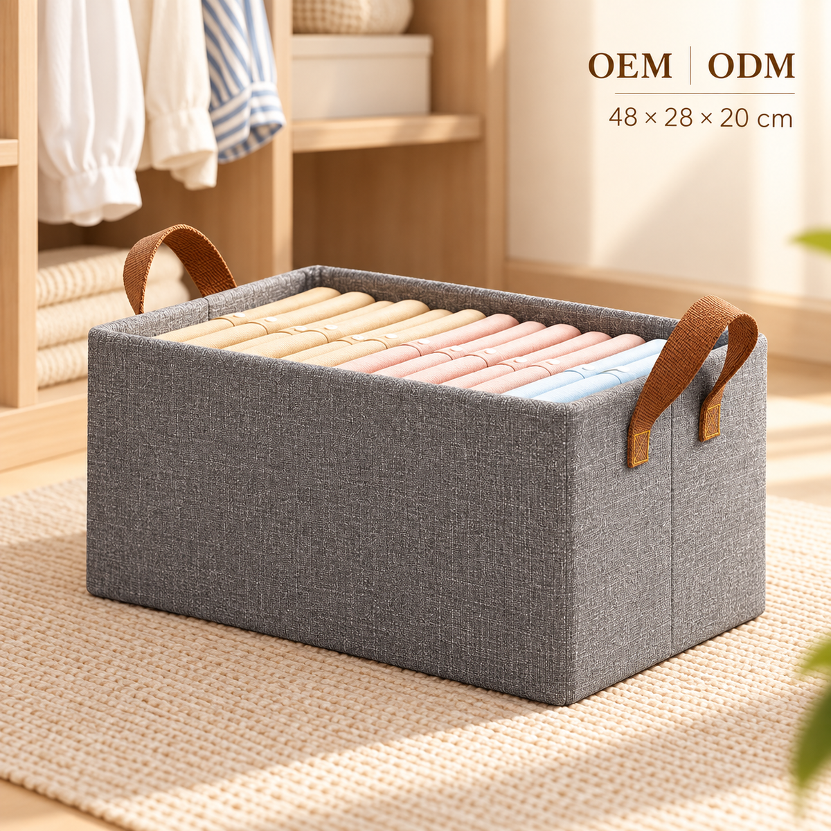 Gray foldable cationic fabric storage box with two carry handles, shown with clothing inside, 48 × 28 × 20 cm